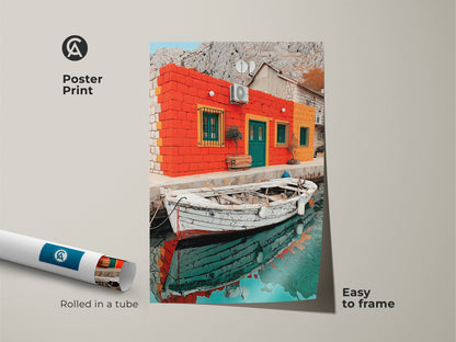 This Mediterranean scene is printed as a poster. It shows a coastal boat artwork and orange teal houses that create a vibrant landscape. It is a travel lover gift idea and folk art coastal decor.