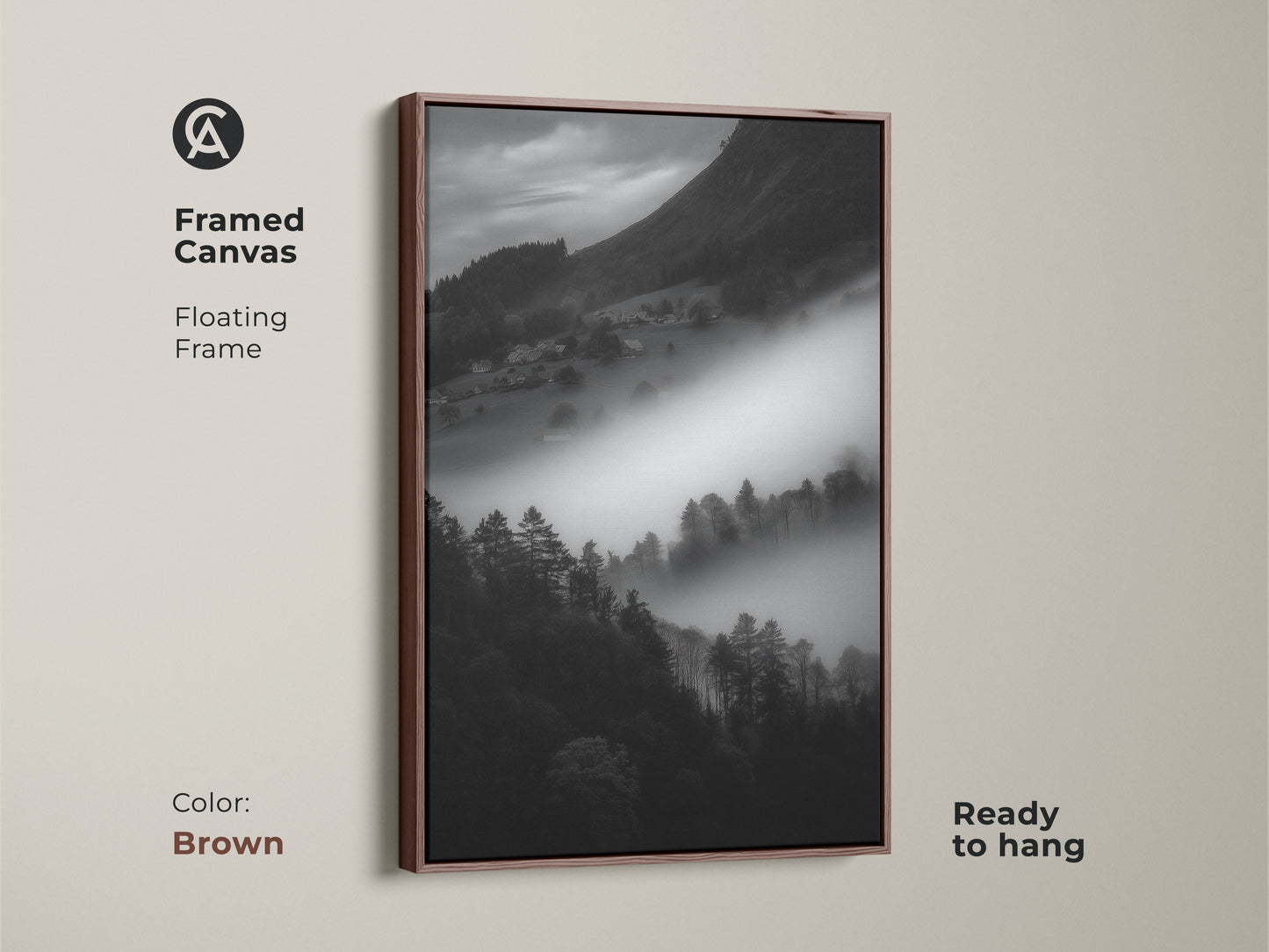 Brown framed canvas of a foggy mountain village. This monochrome landscape features black and white nature canvas art. Contemporary wall decor is ready to hang. The fine art landscape has a floating frame.