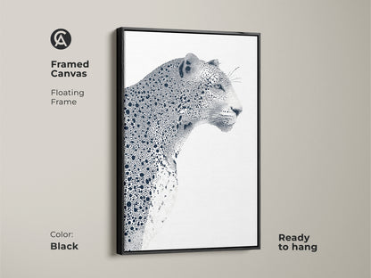 Framed canvas featuring a detailed leopard artwork. This floating frame canvas print is ready to hang. The black frame complements the black and white artwork. This adds a modern touch to your wall decor. Perfect for wildlife art lovers.