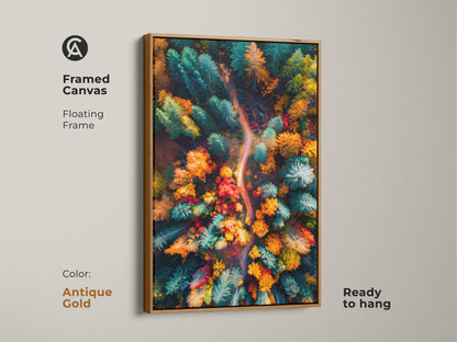 Autumn forest aerial view art print. This framed canvas artwork is displayed in an antique gold floating frame. The vibrant colors of the forest pop against the metallic frame. This canvas is ready to hang and enjoy in your home.