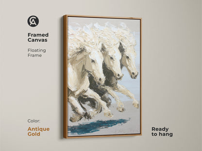 Framed canvas print of galloping white horses art with an antique gold floating frame. This equestrian wall decor is ready to hang and brings a touch of sophistication to any room. The impressionistic horse canvas features a neutral color palette. The antique gold frame enhances the animal artwork.