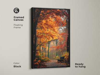 Framed canvas of a forest path in autumn. This floating frame is black. The fall foliage artwork is ready to hang. The framed art adds elegance to any room.