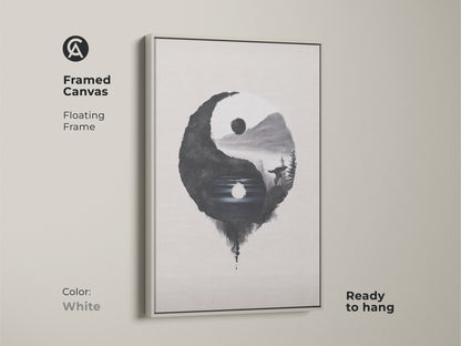 Framed Canvas in white displays Yin Yang Wolf art. The floating frame is ready to hang. Minimalist ink wash print adds balance. Black white nature art offers contemplation. Perfect as a housewarming gift.