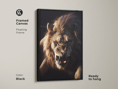 Fierce Lion Face Wall Art on framed canvas with a floating frame in black. This wildlife animal poster decor is ready to hang. The intense lion gaze art adds untamed elegance to any room. Perfect as powerful animal wall art.