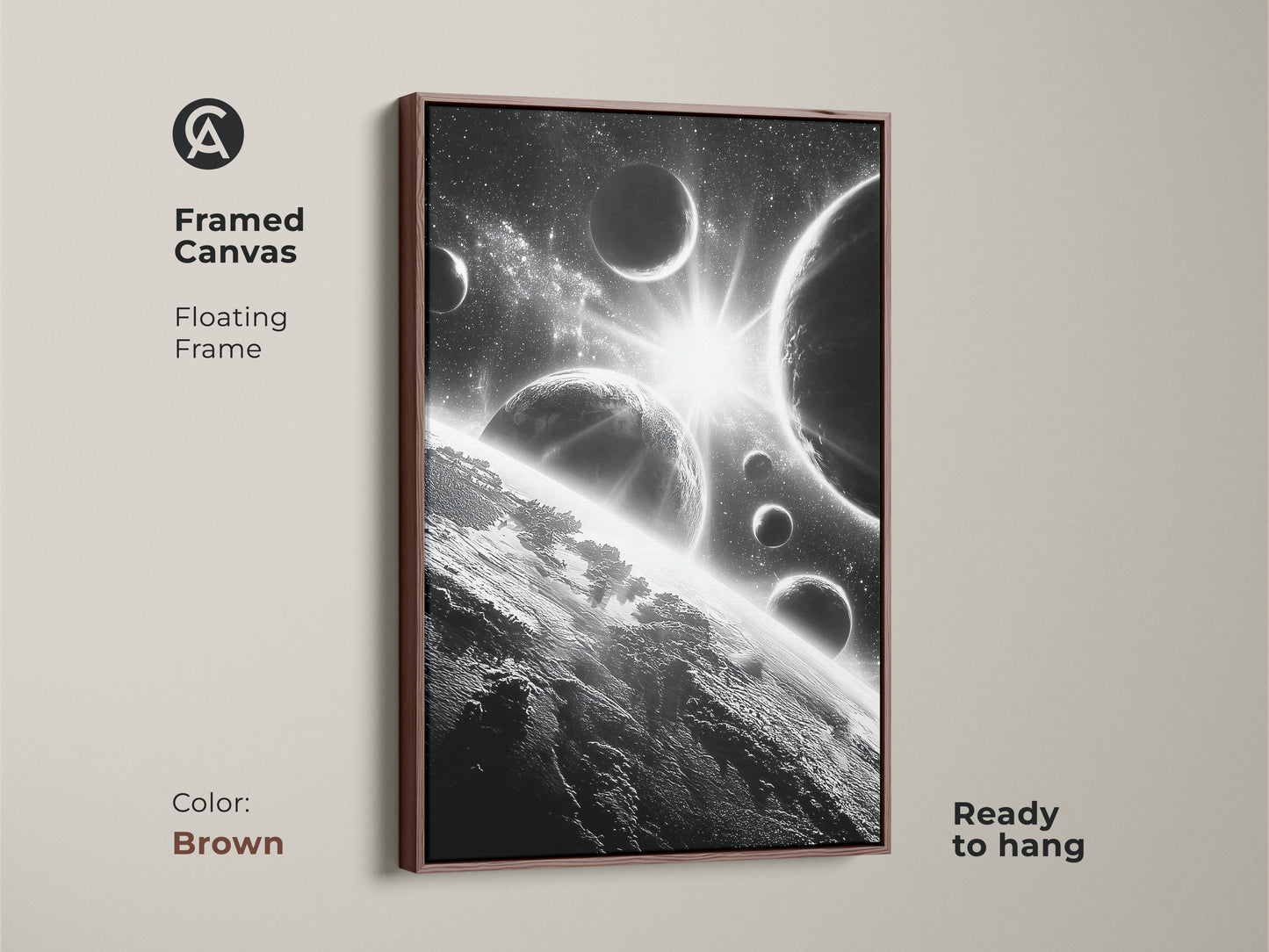 Framed canvas of space art. This brown framed artwork features planets and stars. Ready to hang and adds a touch of warmth to any room. The brown frame complements the monochrome image. A perfect gift for art and space enthusiasts.