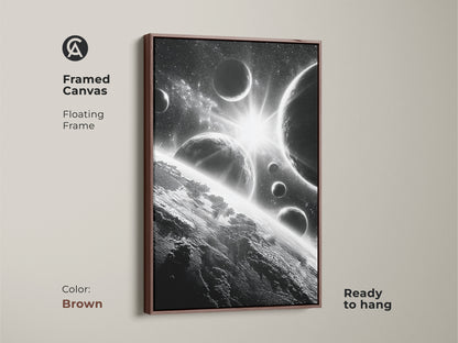 Framed canvas of space art. This brown framed artwork features planets and stars. Ready to hang and adds a touch of warmth to any room. The brown frame complements the monochrome image. A perfect gift for art and space enthusiasts.