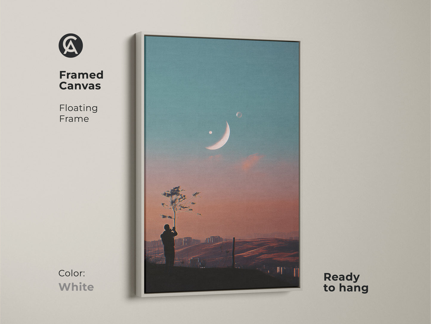 Framed canvas of surreal space artwork. Floating frame in white. This dreamy moon canvas art is ready to hang. Features a celestial landscape wall art. Perfect for modern bedroom decor. The fantasy tree silhouette print enhances any room.