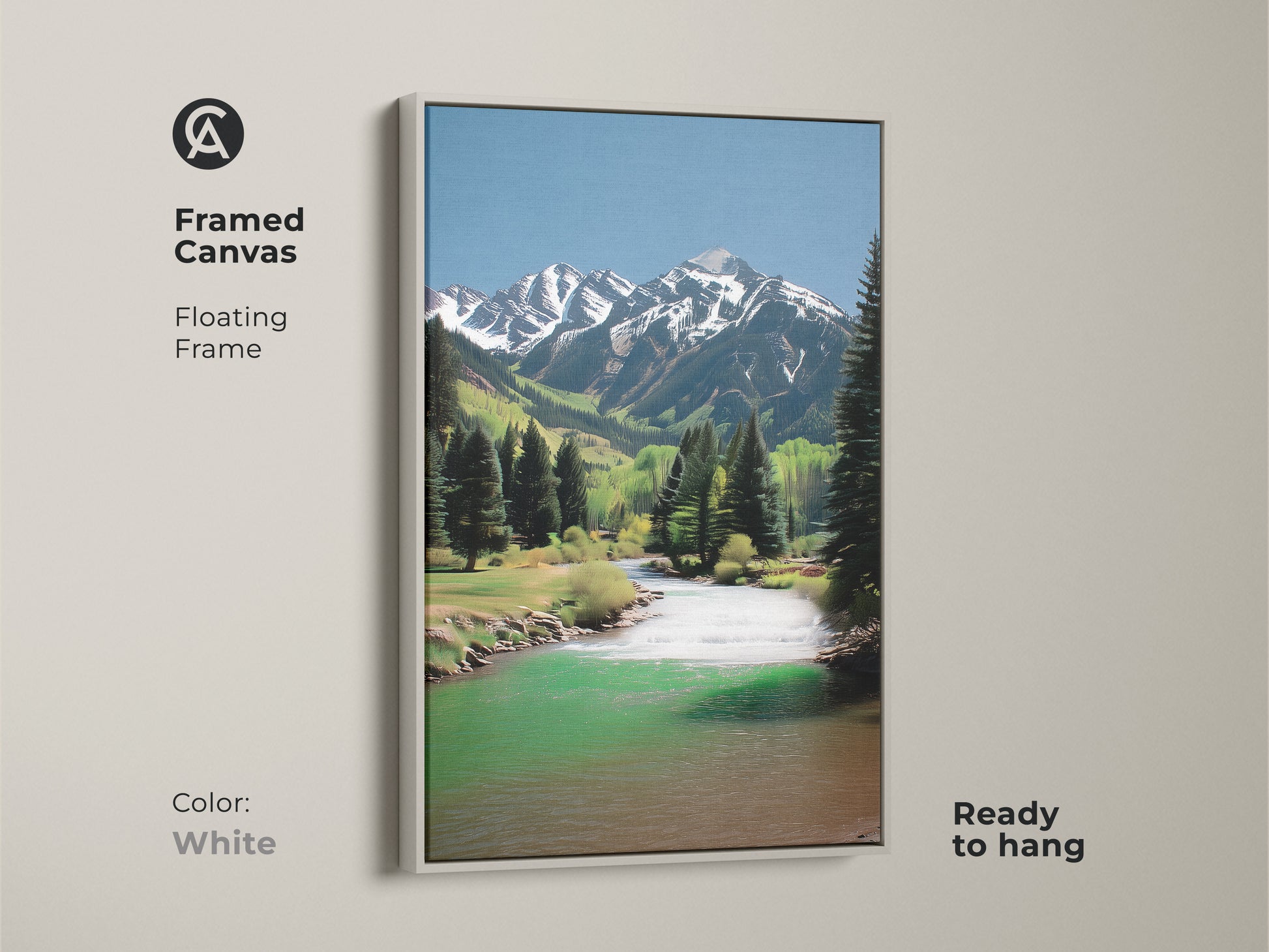 Framed canvas artwork. This piece shows a mountain river landscape with snow-capped peaks and pine trees. The rustic artwork features a white floating frame. Ready to hang. Ideal for a tranquil space.