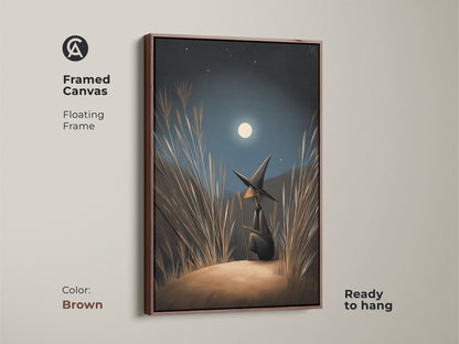 Framed Canvas of fantasy wall art ready to hang. The witch gazes at the moonlight. The Floating Frame is brown. Find Navy Blue Gold Moonlight Canvas art. This boho bedroom decor is a perfect Halloween Occasion Gift.
