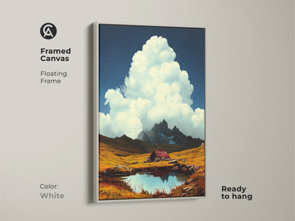 Framed canvas showcasing a mountain cabin by an alpine lake. The artwork features a deep blue sky white clouds. Rustic golden field. White floating frame. Ready to hang. Scenic wall art brings nature indoors. Perfect housewarming gift. Enhances any room's aesthetic.