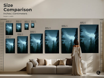Size comparison of misty forest canvas art in inches and centimeters. See how various sizes from 20x30 to 45x67 inches look above a sofa. Visualize the scale of this pine tree landscape print. Perfect for planning your nature wall decor.