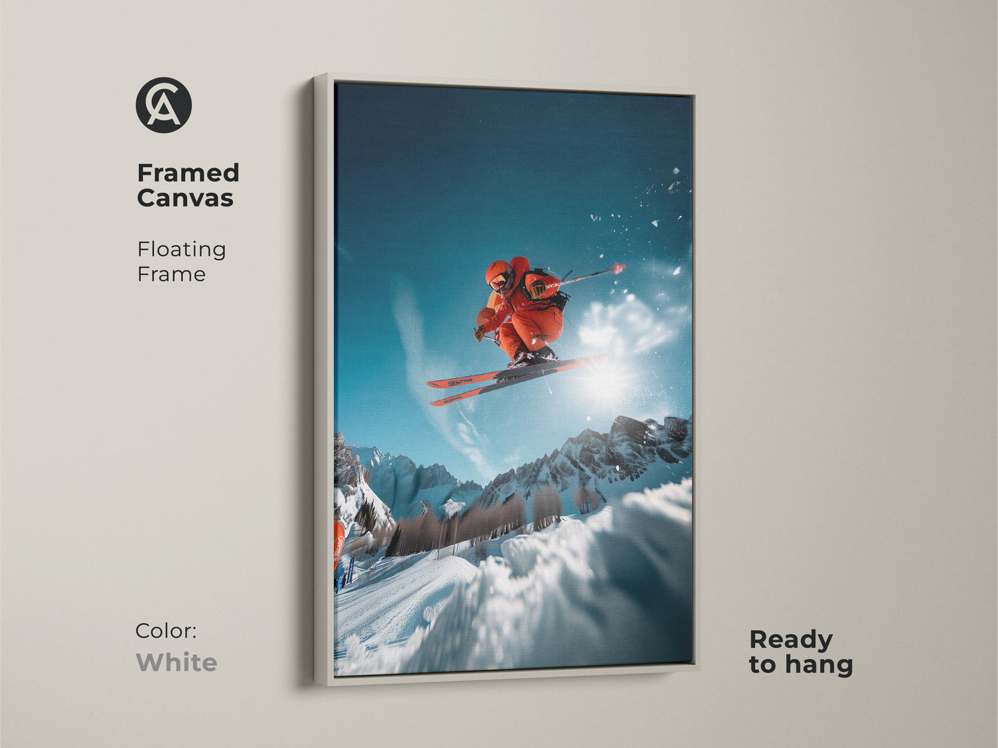 A framed canvas art print of a skier. The white floating frame creates a clean modern look. The skier is captured mid-jump over a snowy mountain range. This ready-to-hang artwork brings energy and style. Ideal for contemporary homes and offices