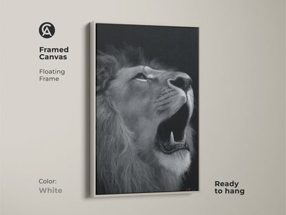 Photorealistic lion canvas in a clean white floating frame. This framed monochrome wildlife art is ready to hang. Its a contemporary black and white animal artwork. A sophisticated piece perfect for modern home decor or a gift for animal lover. Captivating lion art.