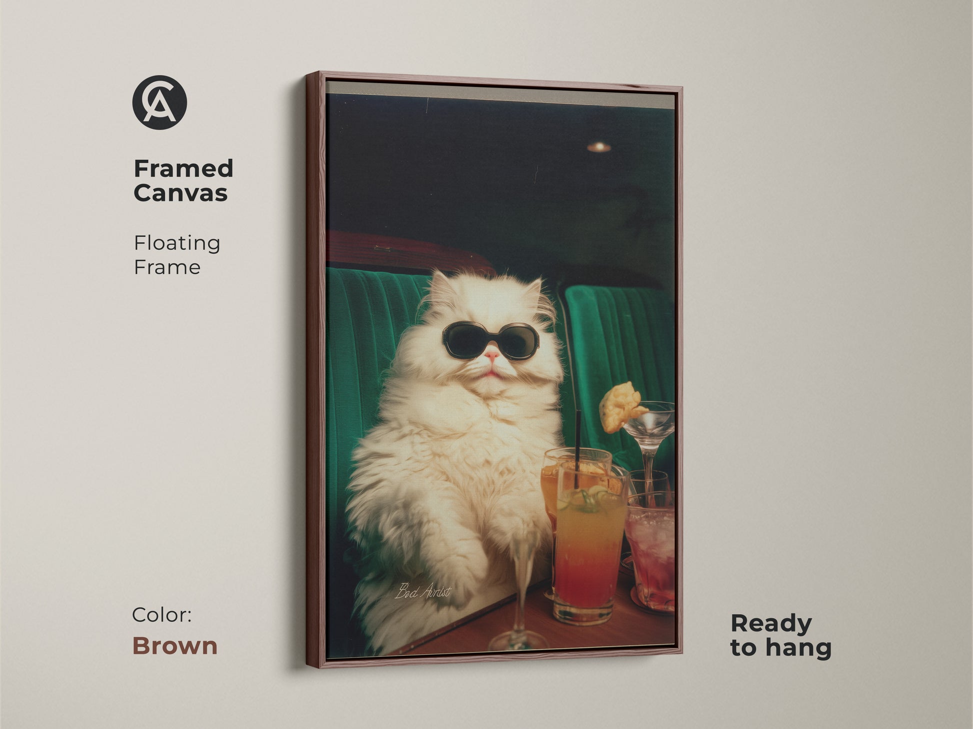 Framed canvas art of a white cat wearing sunglasses. The brown floating frame enhances this unique piece. The cat is sitting in a green booth with cocktails. This framed artwork is ready to hang. A great gift idea.