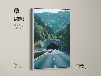 Green Forest Tunnel art in a framed canvas with a white floating frame. Ready to hang for easy decor. Contemporary travel landscape with realistic car photography. Travel destination canvas for car lovers. Automotive themed wall art brings scenic nature print to modern homes. Unique travel gift.