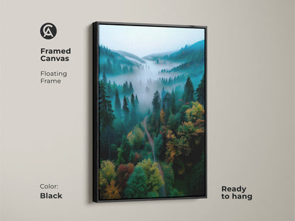 Framed canvas featuring a misty forest landscape in a black floating frame. This ready to hang artwork brings nature indoors. Perfect wall art for a calming atmosphere. The artwork is serene.