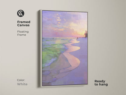 Framed canvas features a floating frame in white. Impressionistic beach sunset artwork is ready to hang. Coastal ocean waves wall print with a purple pink sky landscape. Seaside home decor gift complements any room.