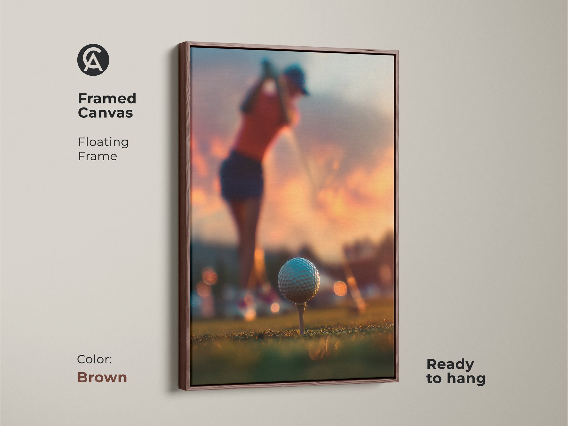 Framed canvas of golf art in a brown floating frame. A golfer is captured mid-swing. The golf ball is ready for action on the tee. Sunset provides a stunning backdrop. Ready to hang golf art. Enhance your sports themed home decor today.