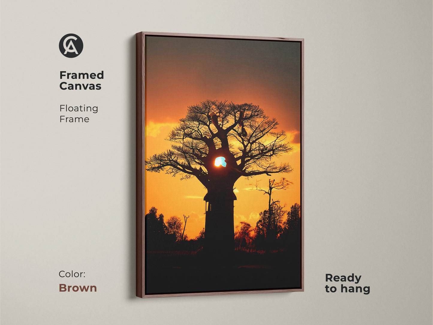 Framed African Baobab tree canvas artwork. The brown floating frame complements the warm sunset colors. This boho nature print is ready to hang. This is a unique landscape print for your home.