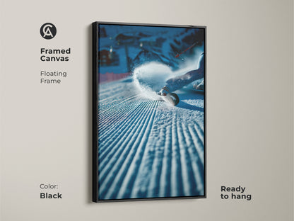 Framed canvas art print of a snowboarder in action. The floating frame is black. This piece is ready to hang. It offers a sleek and modern look. Perfect for showcasing your love for winter sports. Order yours now.