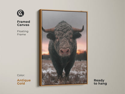 Framed canvas showcasing a bull in a winter landscape. Antique gold floating frame adds elegance to this wildlife animal art. Rustic farmhouse wall art ready to hang. Brown gray pink art for a cozy home. Perfect housewarming gift art for animal lovers.