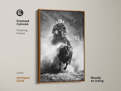 Antique Gold framed canvas with floating frame featuring black and white rodeo art. This bull riding canvas print showcases western cowboy wall art. A rustic ranch art print is ready to hang. Ideal action sports photography for man cave rodeo decor.