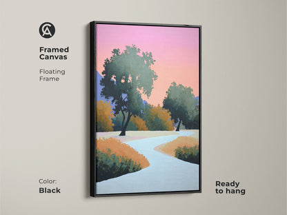 Black framed canvas showing abstract landscape. This contemporary trees wall art includes a floating frame. The pink and orange sky artwork enhances the modern nature scene. Ready to hang this stylized nature painting.