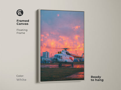 Aviation art on framed canvas with a white floating frame. The helicopter artwork is clean and modern. This ready-to-hang art piece brings aviation into your home. Notice the stunning sunset.
