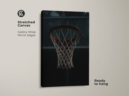 This stretched canvas features gallery-wrapped basketball hoop artwork. The mirror edges add a modern look to the industrial sports decor. Ready to hang this urban sports wall art is great for a man cave or game room.