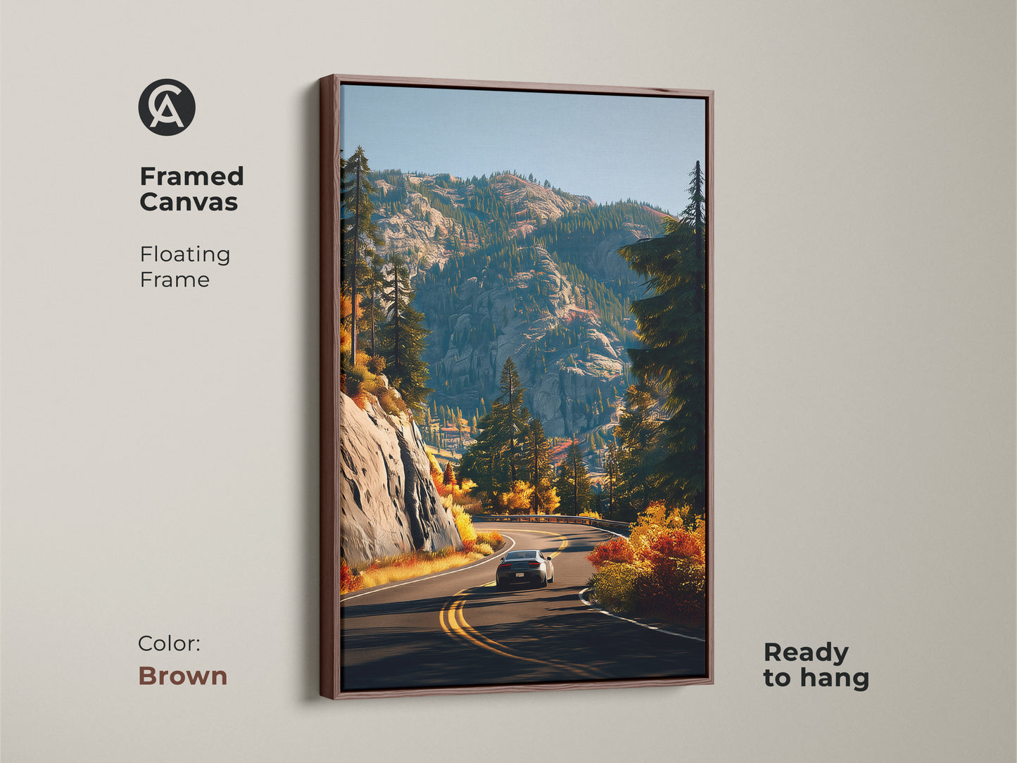 Framed canvas art featuring a mountain road scene. A car is driving amidst the autumn colors. This ready-to-hang artwork has an antique gold floating frame. Ideal for adding a touch of nature and adventure to your home decor. Perfect for modern farmhouse style.