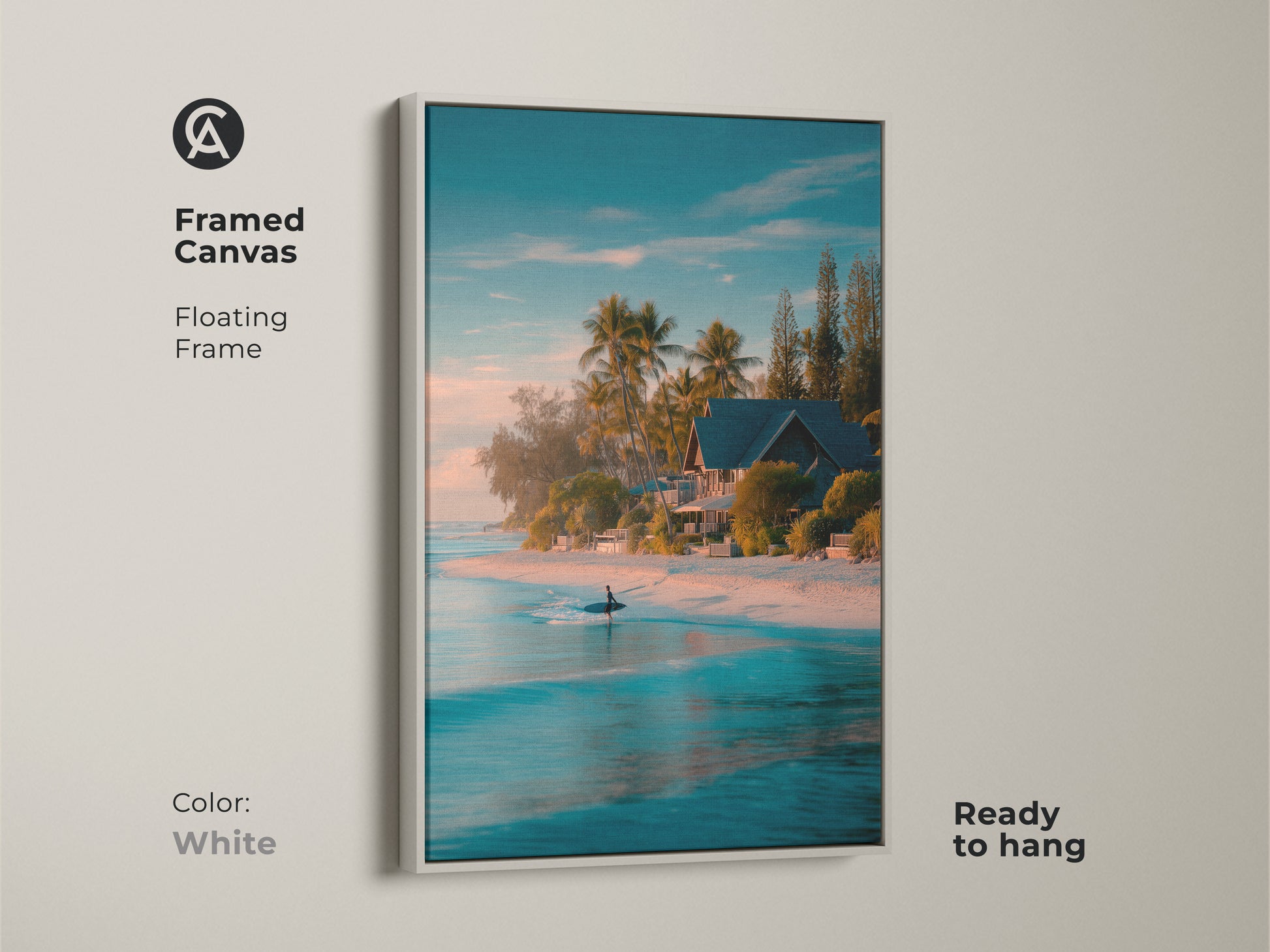White framed canvas artwork displaying a serene beach scene. The artwork features a surfer in turquoise water. Palm trees and a beach house enhance the coastal vibe. The floating frame adds a modern touch. Ready to hang this framed art creates a serene atmosphere.