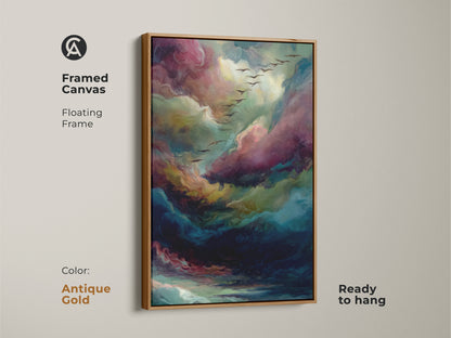 Framed canvas displaying colorful cloud art. The floating frame is an antique gold. It's a ready to hang piece. Ideal for adding sophistication to any room. The painting includes birds flying.