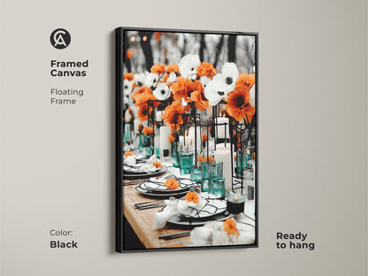 Framed canvas artwork featuring orange and white anemones. The black floating frame enhances this contemporary dining room wall art. This elegant table setting canvas is ready to hang. A perfect floral centerpiece print for residential interiors. Ideal as a home entertainer gift or for upscale restaurant art.