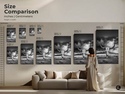 Size comparison of monochrome longhorn skull desert landscape art. See how different sizes fit above a couch. Available in inches and centimeters. Choose the perfect size for your space. Options include 16x24 24x36 36x54 and 45x67. Enhance your rustic western home decor.