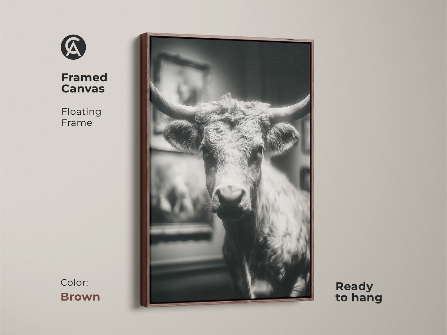 Brown framed canvas featuring a black and white Texas Longhorn bull. The ready-to-hang artwork features a floating frame. Add a touch of western elegance to your home with this animal art. The artwork brings a rustic touch to any room.