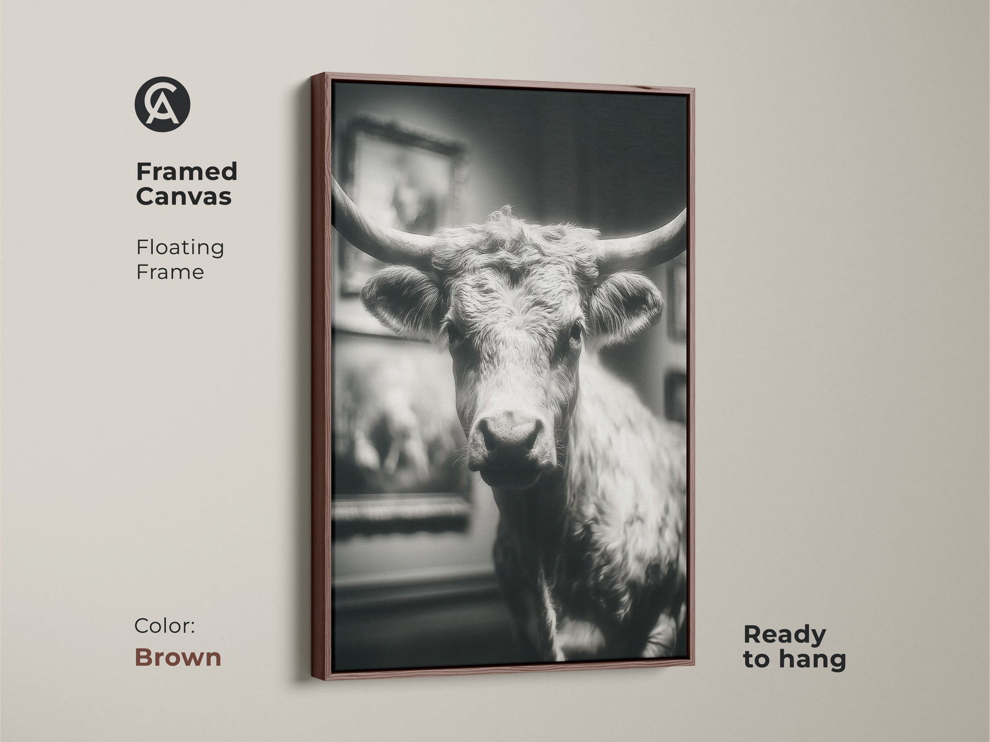 Brown framed canvas featuring a black and white Texas Longhorn bull. The ready-to-hang artwork features a floating frame. Add a touch of western elegance to your home with this animal art. The artwork brings a rustic touch to any room.