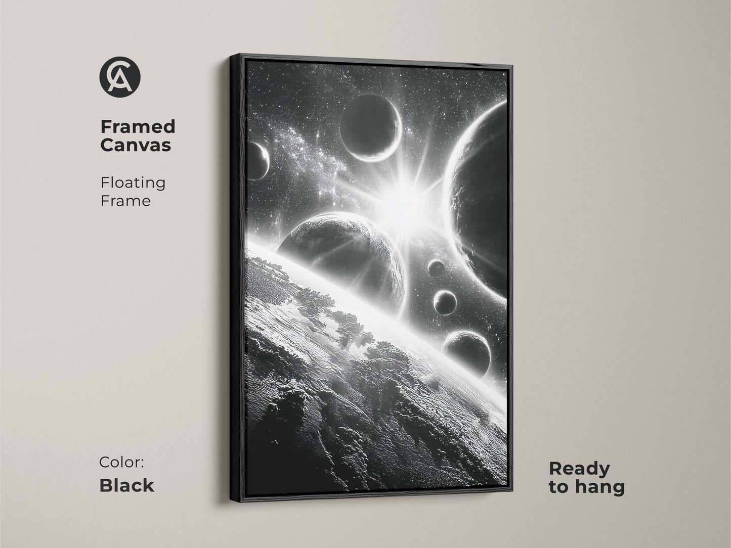 Framed canvas of space art. This black framed artwork features planets and stars. Ready to hang and adds a touch of elegance to any room. The black frame enhances the monochrome image. A perfect gift for space enthusiasts.
