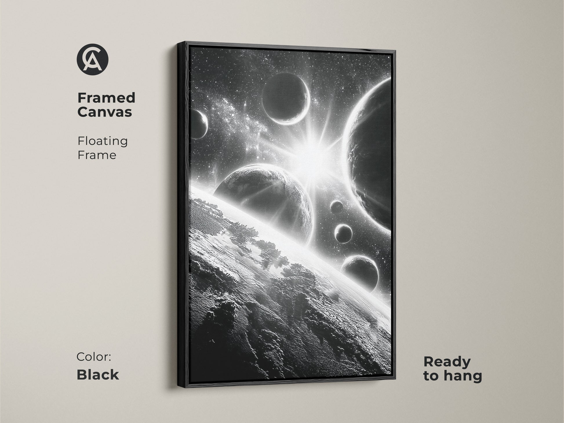 Framed canvas of space art. This black framed artwork features planets and stars. Ready to hang and adds a touch of elegance to any room. The black frame enhances the monochrome image. A perfect gift for space enthusiasts.