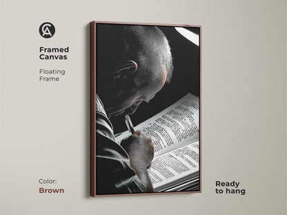 Black and white framed canvas art featuring a man reading with a brown floating frame ready for display. This sophisticated contemporary art serves as excellent reading room art and library decor. It's an ideal literature gift for an intellectual person. This complements office bookshelf art and academic wall art beautifully.