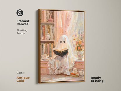 Framed canvas of a ghost reading wall art with an antique gold floating frame. This pastel ghost art print is ready to hang. It enhances cozy study room decor in an eclectic style. A heartwarming Halloween gift for her. The bookshelf artwork in cream peach adds a soft vintage touch for book lovers.
