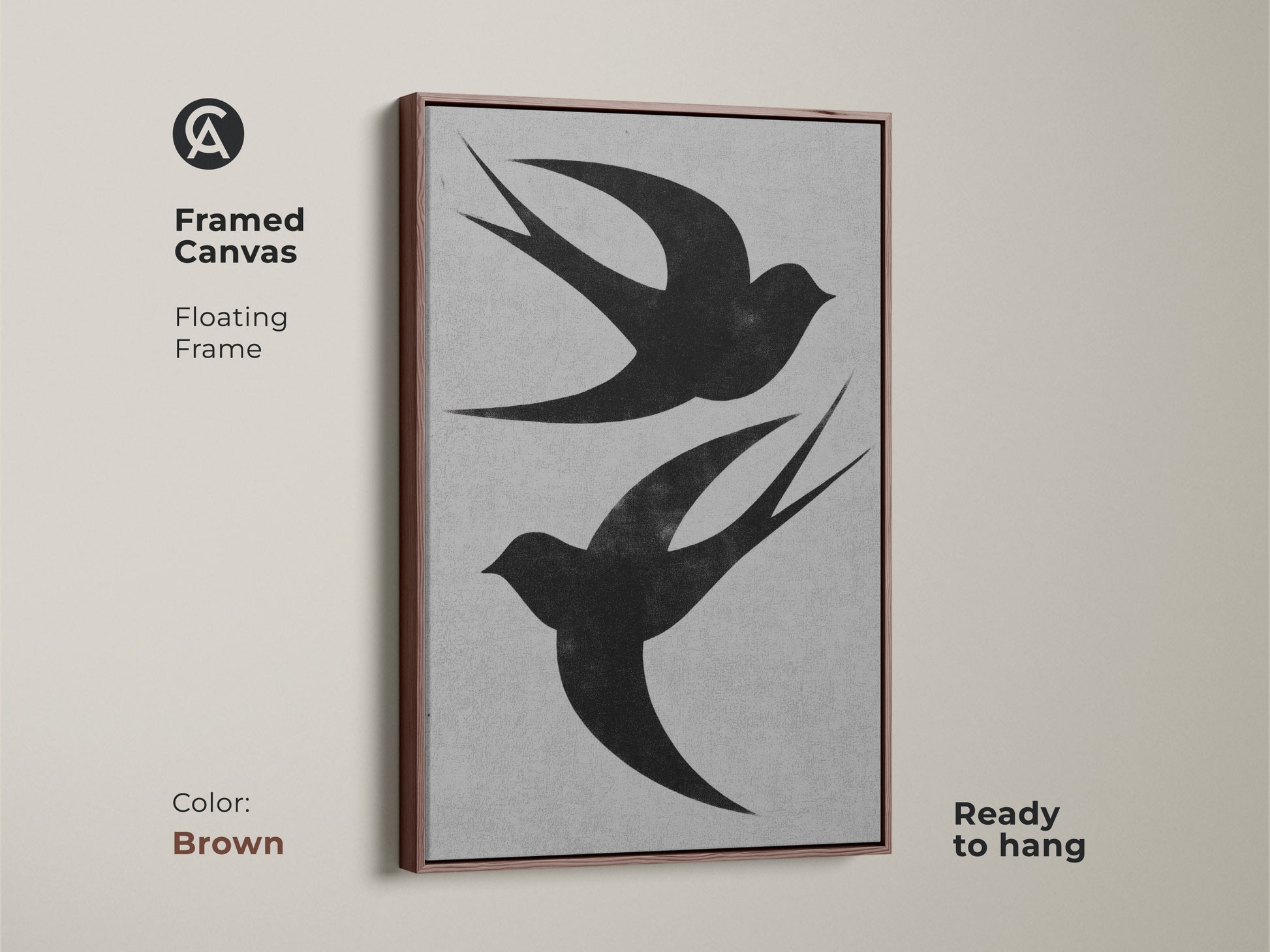 Framed canvas art displays a black and white bird print. Two swallows are silhouetted against a textured gray backdrop. The floating frame has a brown finish and the art is ready to hang. A nature-inspired housewarming gift.