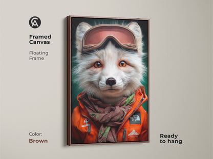 Framed canvas artwork featuring a fox in ski goggles and an orange jacket with a brown floating frame. This winter wildlife art is ready to hang. Features an eclectic animal portrait. Perfect decor for animal enthusiasts. Add a unique touch to your walls with this cozy art print.