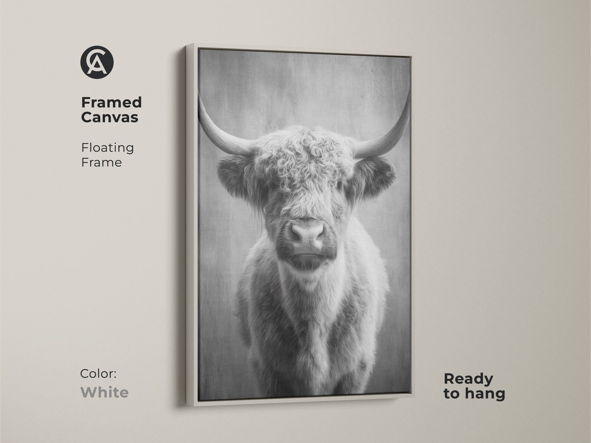 White framed canvas displaying a monochrome highland cow. The floating frame complements the rustic farmhouse decor. Ready to hang this Scottish cattle canvas art is a great gift for cow lovers. A scandi farmhouse art piece.
