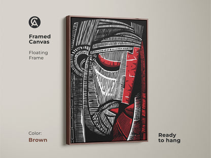 Framed canvas featuring a black red and white abstract face. This cubist portrait wall art with a floating frame is ready to hang. Perfect modern artwork for a study or office. The brown frame complements the linocut style art.