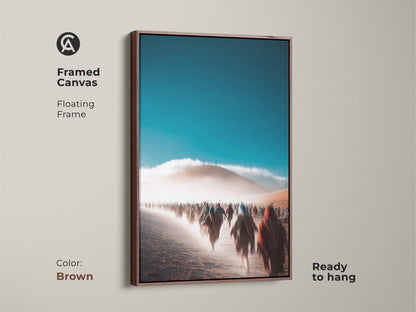 Framed canvas with a floating frame showcasing an abstract desert procession. Brown frame offers a warm natural aesthetic. The teal and orange hues create a captivating visual. Ready to hang for effortless installation. Contemporary home decor enhances any living room. Ideal as travel lover gift.