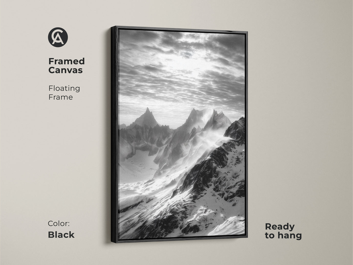 Framed canvas with monochrome mountain art. The snowy peaks canvas print features a floating black frame. This black and white landscape is ready to hang. Modern nature wall decor for a minimalist aesthetic.