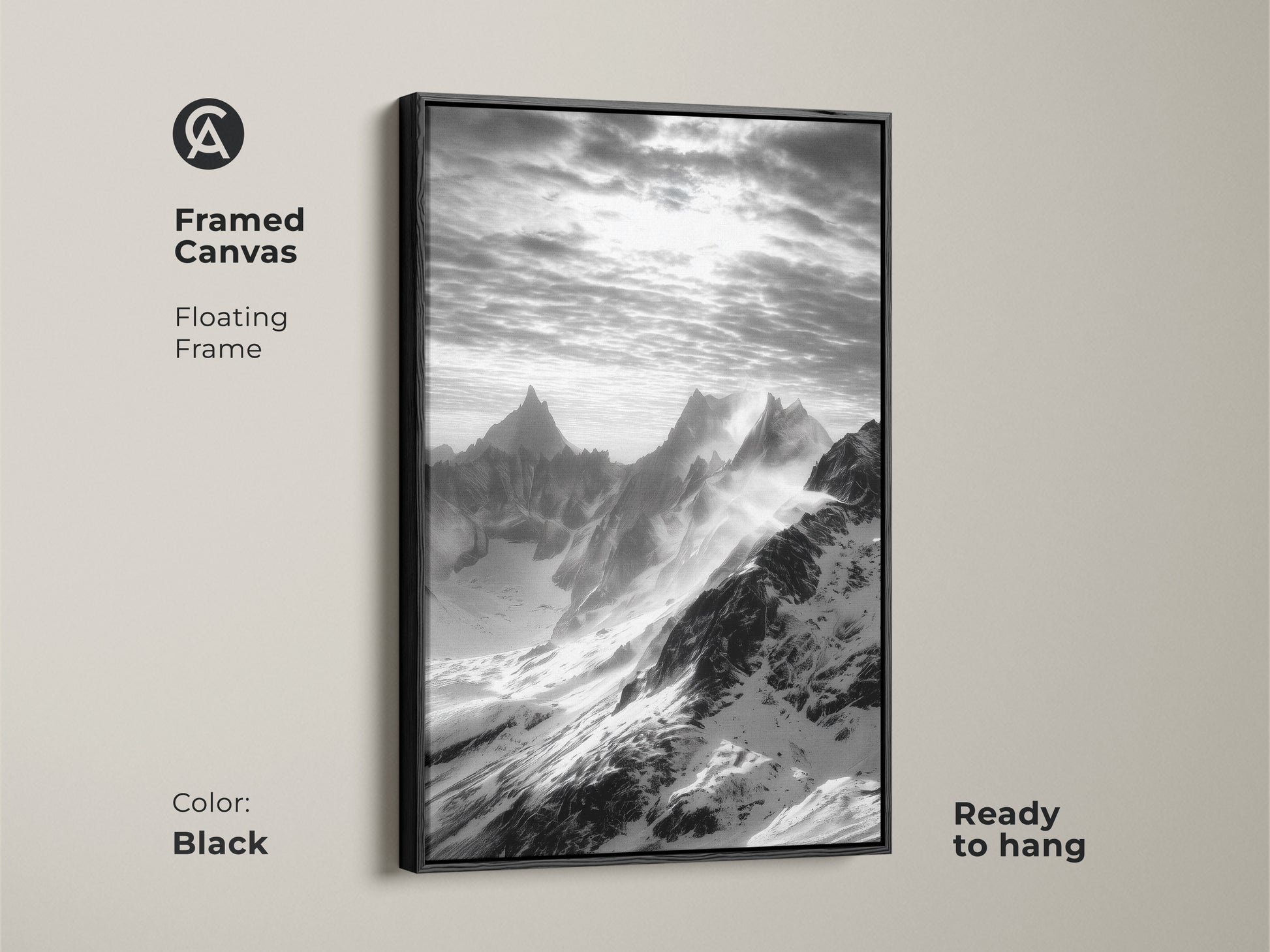 Framed canvas with monochrome mountain art. The snowy peaks canvas print features a floating black frame. This black and white landscape is ready to hang. Modern nature wall decor for a minimalist aesthetic.