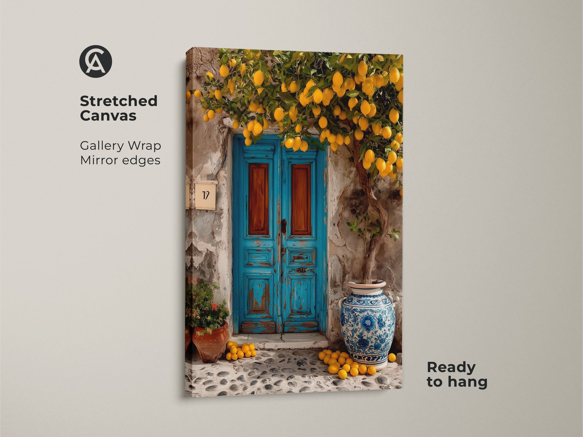 Stretched canvas art showcasing a lemon tree and a rustic blue door. Gallery-wrapped with mirrored edges it is ready to hang. This boho kitchen decor adds Mediterranean charm to your home. The yellow lemons and distressed blue door create a travel-inspired aesthetic.