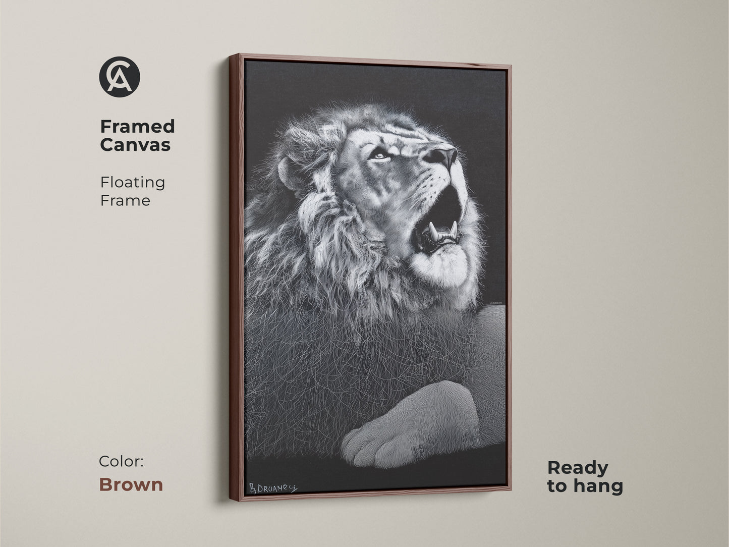 Brown framed monochrome lion canvas. This floating framed wildlife decor is ready to hang. It's suited for a contemporary bedroom or office. This powerful animal art makes a great gift.