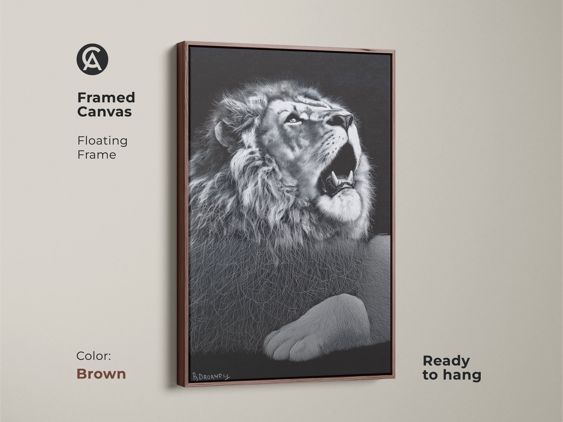 Brown framed monochrome lion canvas. This floating framed wildlife decor is ready to hang. It's suited for a contemporary bedroom or office. This powerful animal art makes a great gift.